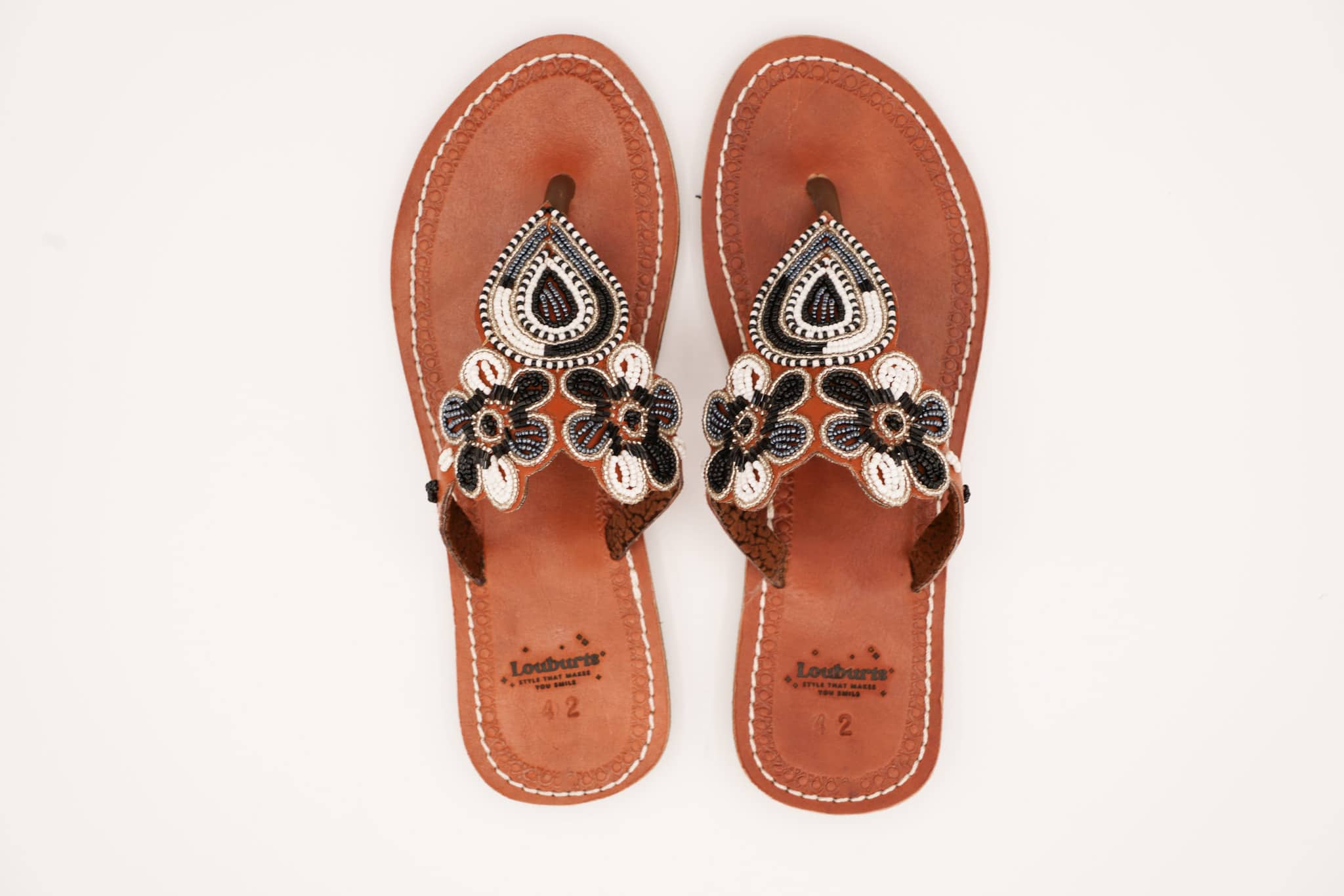 white and black leather sandals top